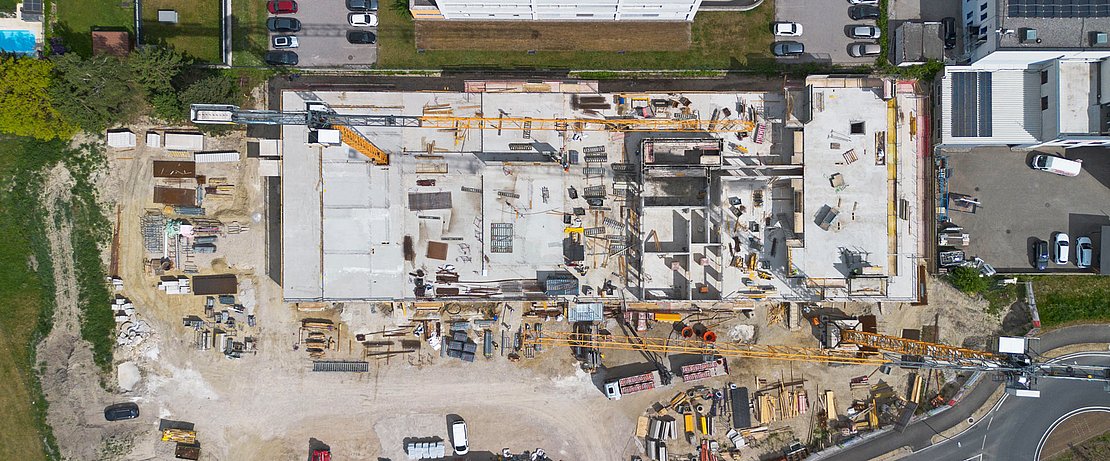 Construction project for a grocery store and residential buildings in Perg