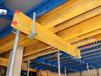 Slab forming infill beam